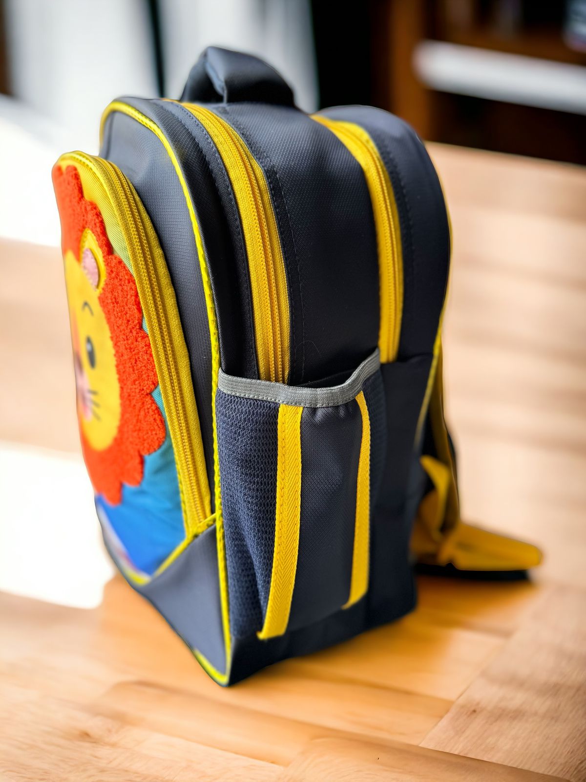 Rule the Playground with the King of the Jungle Backpack! 14"