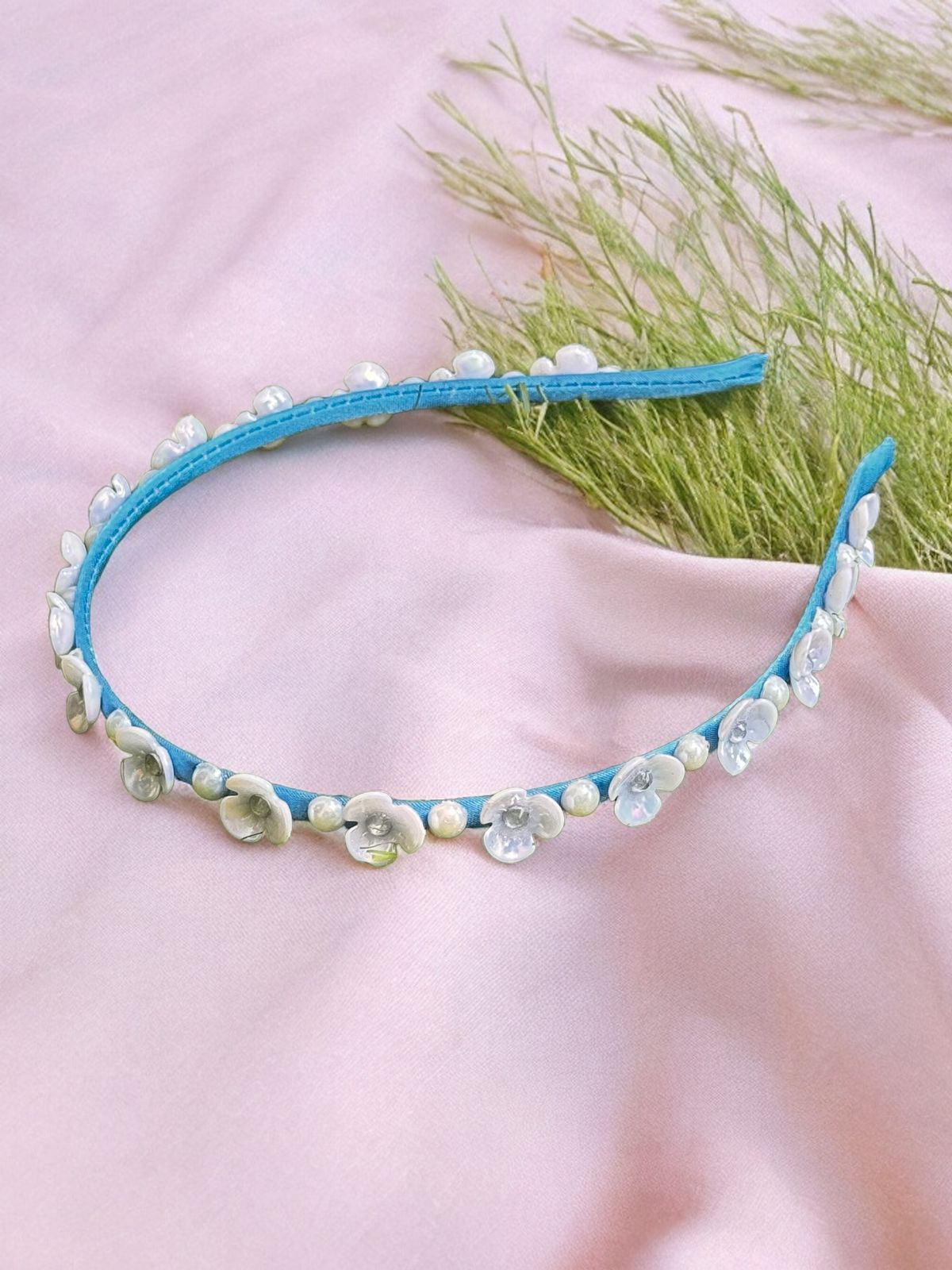 Embrace the Magic with Our Sky Blue Pearl & Flower Hairband