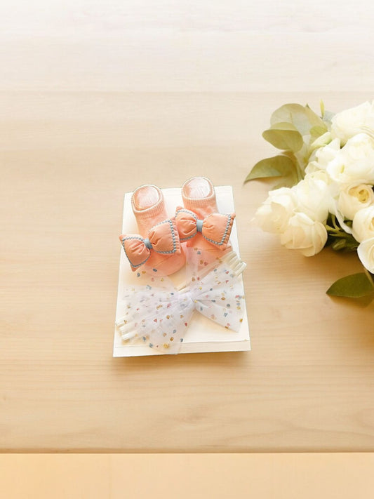 Adorable Comfort: Baby Booties and Hairband Set