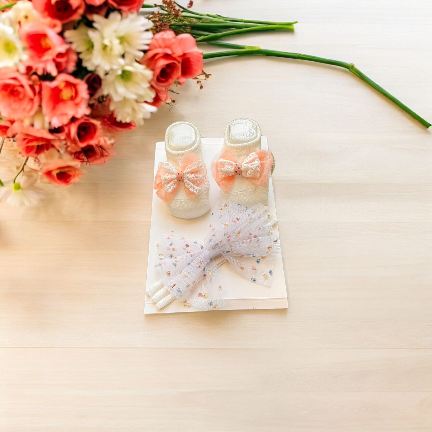 Adorable Comfort: Baby Booties and Hairband Set