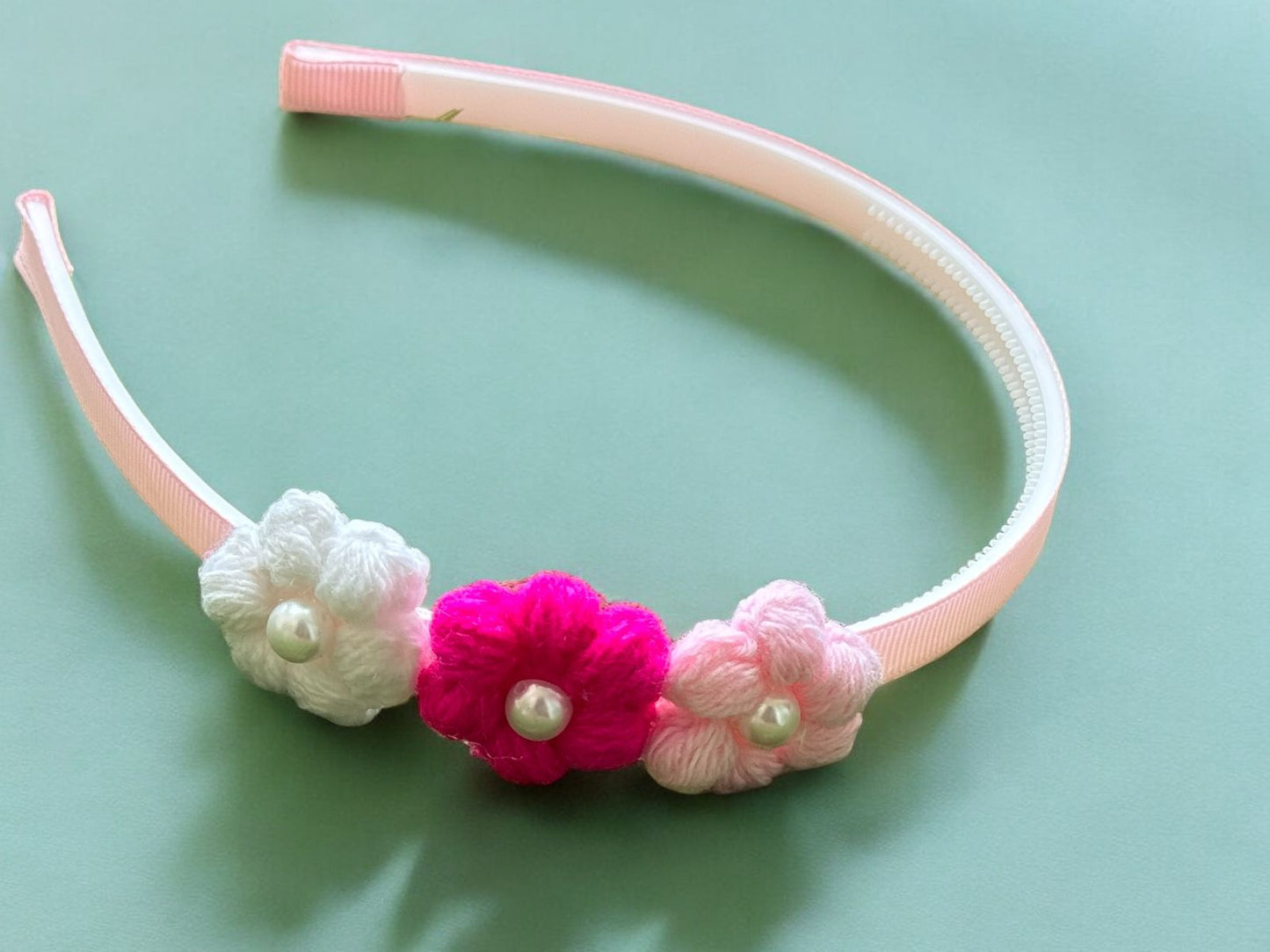 Adorable Pink Headband with Crocheted Flowers and Pearls for Playtime!