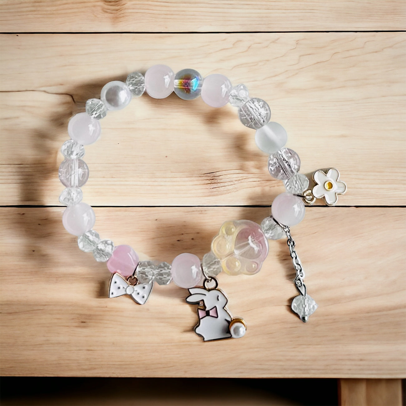 Bunny Magic: Pink and White Beaded Bracelet with Bunny Charm