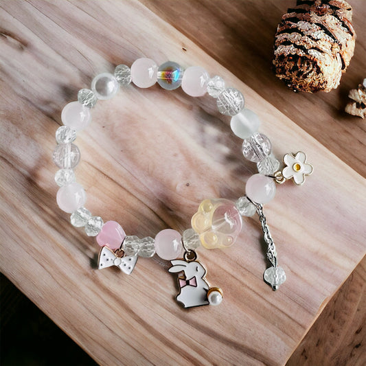 Bunny Magic: Pink and White Beaded Bracelet with Bunny Charm