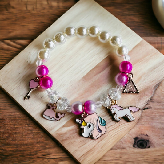 Magical Dreams: Pink and White Beaded Bracelet with Unicorn Charms