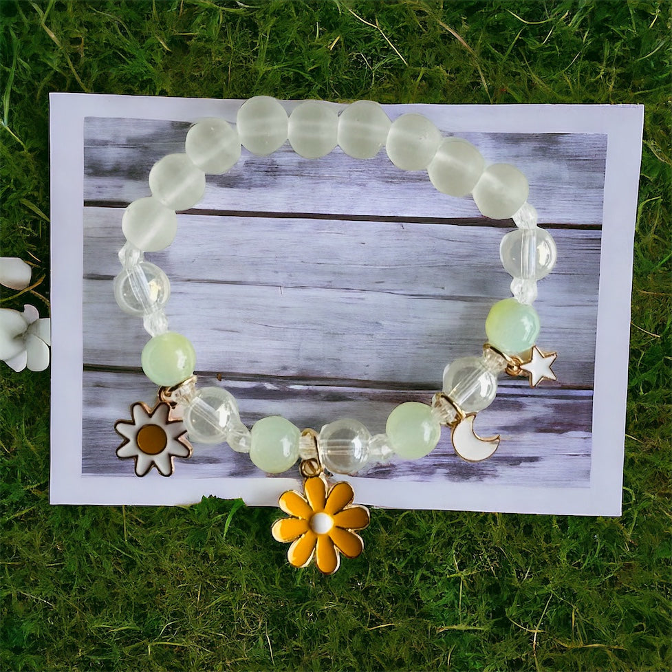 Sunshine & Smiles: Clear Beaded Bracelet with Yellow Flower Charm