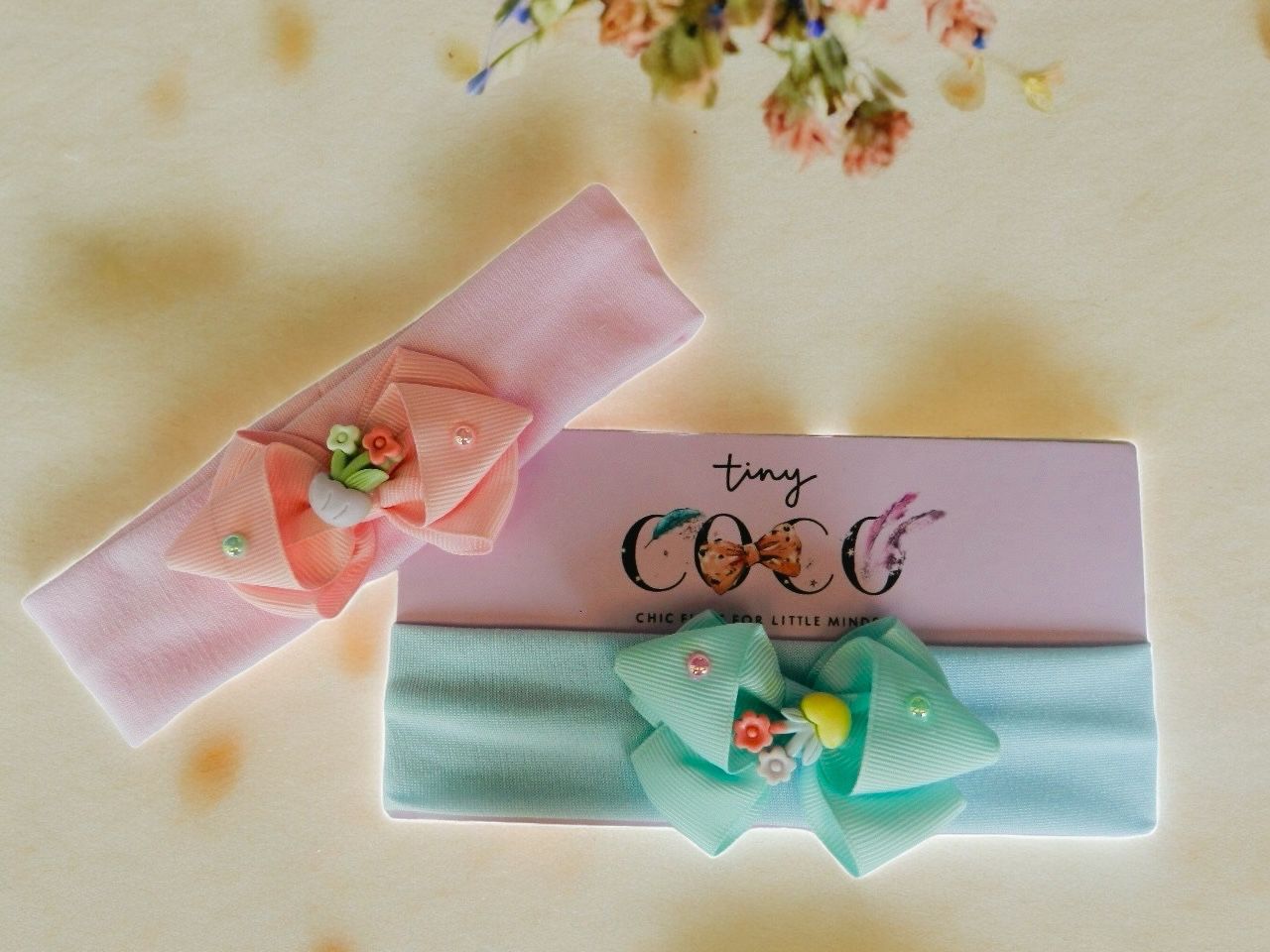 Blossom and Shine: Girls' Headbands with Adorable Flower Charms!